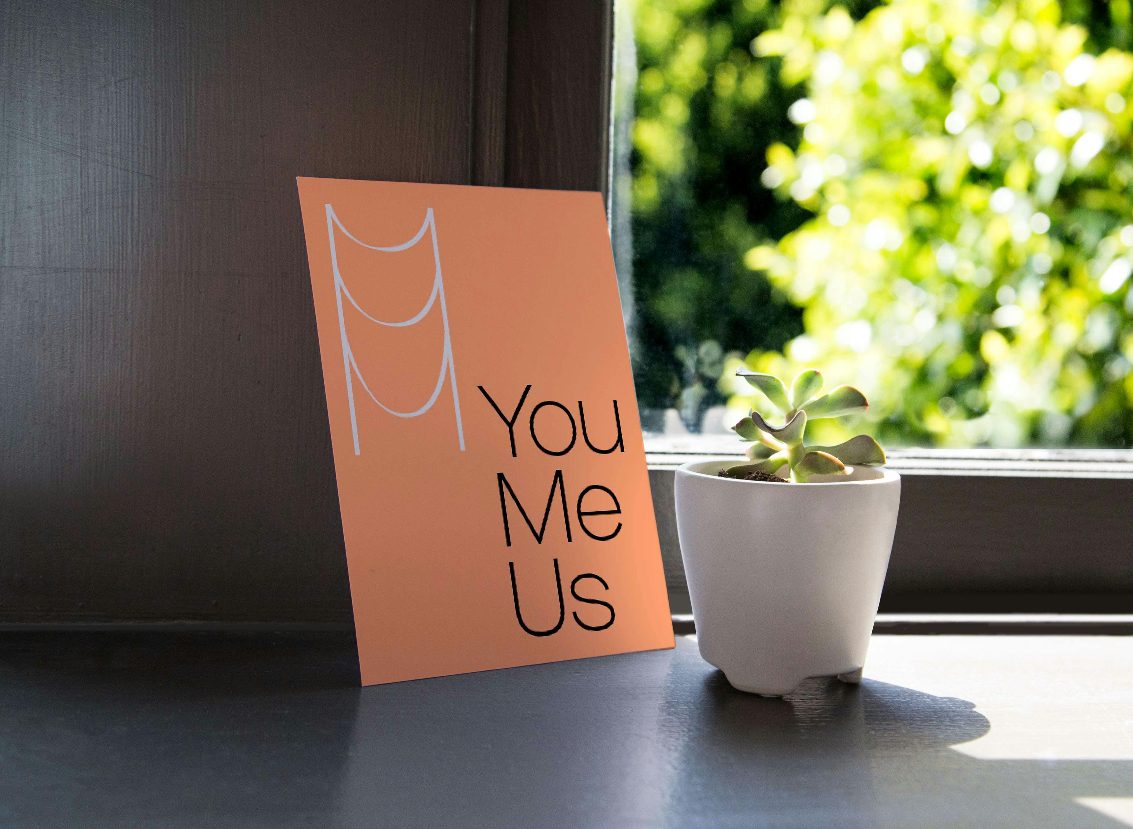 Modern Fertility Postcard says " You, Me, Us" with Community icon