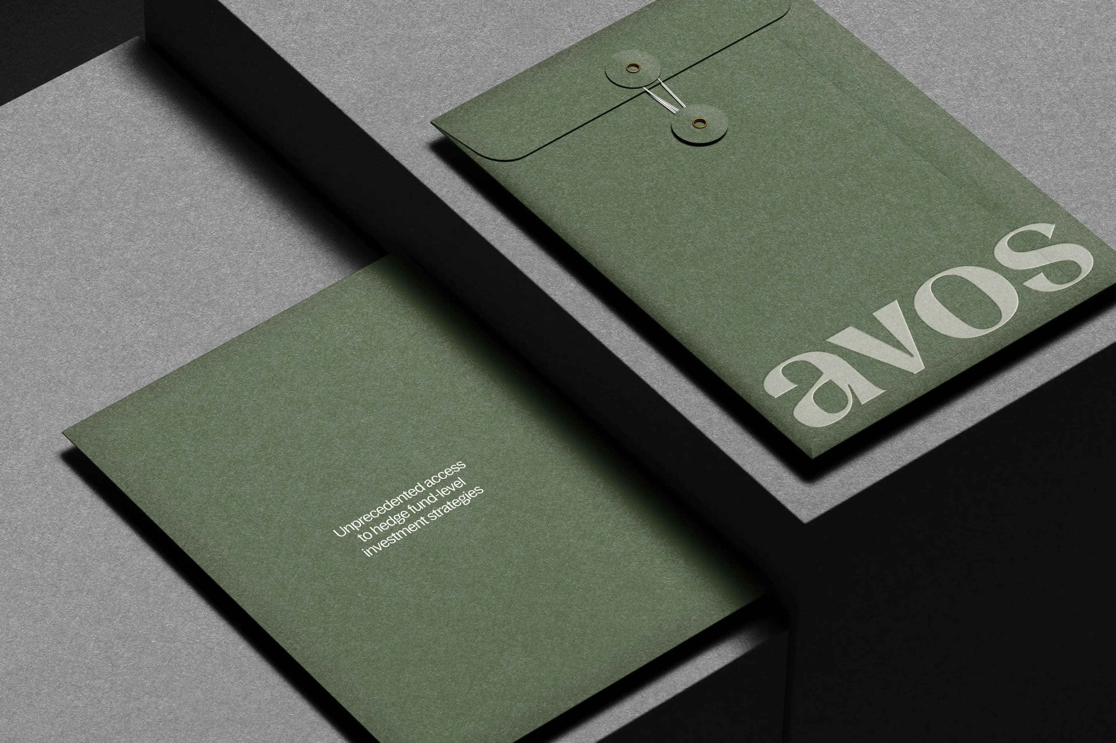 Folders with Avos logo on a table